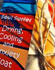 Premium dog drying robe product tag with robe and calming fit details