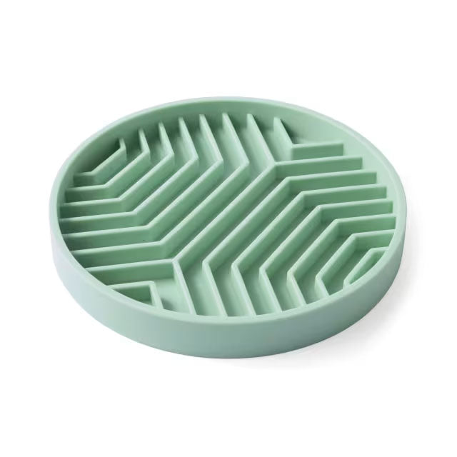 Soft yet sturdy silicone bowl with maze design for slow feeding. Perfect for mindful mealtimes and eco-conscious dog owners.