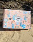 Beautifully designed gift box filled with unique dog gifts, ideal for dog lovers. Perfect for special occasions like birthdays and Christmas, offering personalised options for pets.