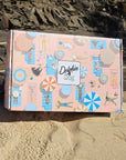 Beautifully designed gift box filled with unique dog gifts, ideal for dog lovers. Perfect for special occasions like birthdays and Christmas, offering personalised options for pets.