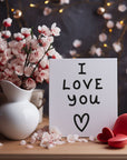Personalised message inside a sweet 'I Love You' greetings card, adding a unique touch of love and sincerity.