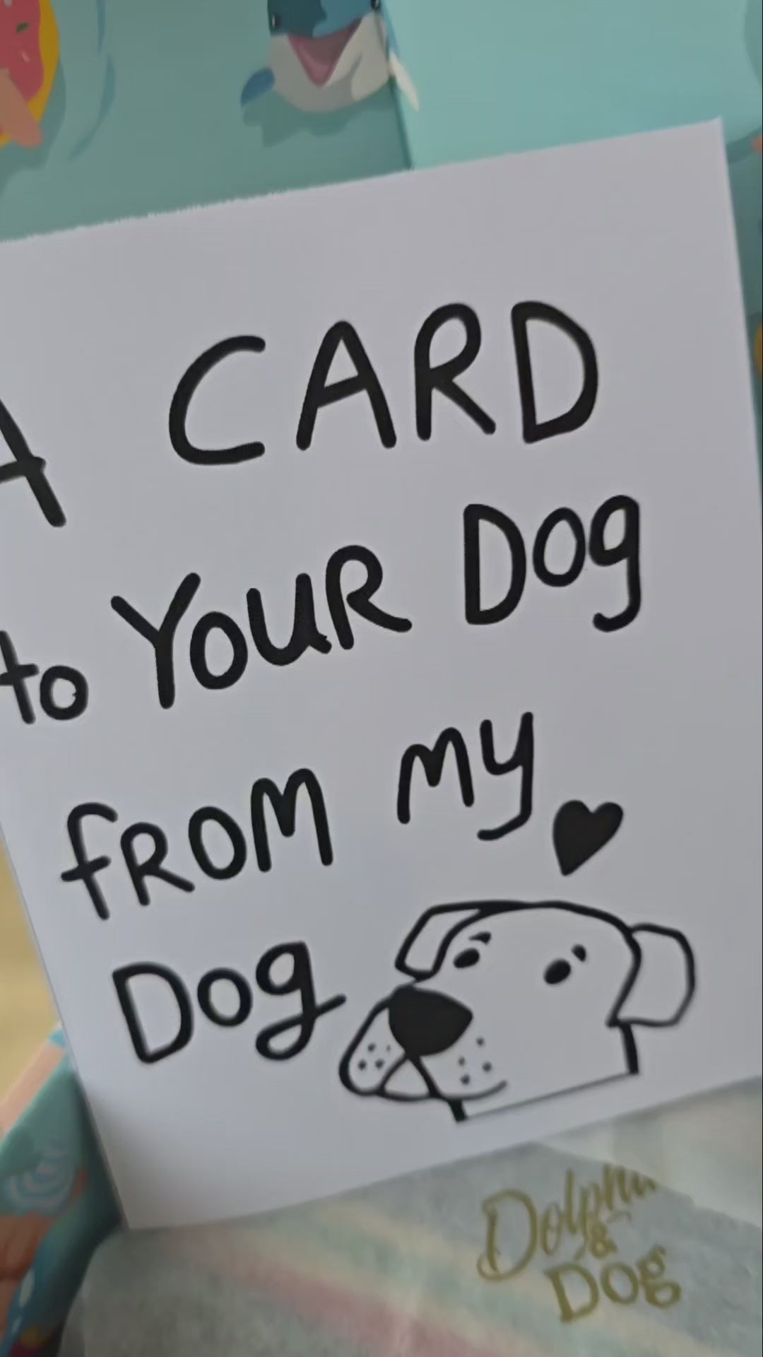 video showing a personalised gift box made for dog lovers, gift hamper contains dog gifts, dog gift box and a greetings card