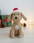 stuffed dog toy, plush oy of a dog with a Christmas hat