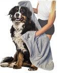 Microfibre Dog Towel: "Microfibre dog towel designed to absorb moisture quickly and effectively, keeping your pet dry and comfortable after any water activity.