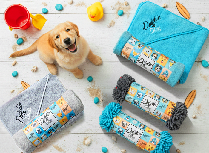 collection of the best dog towels for dogs, happy dog surrounded by dog towels 