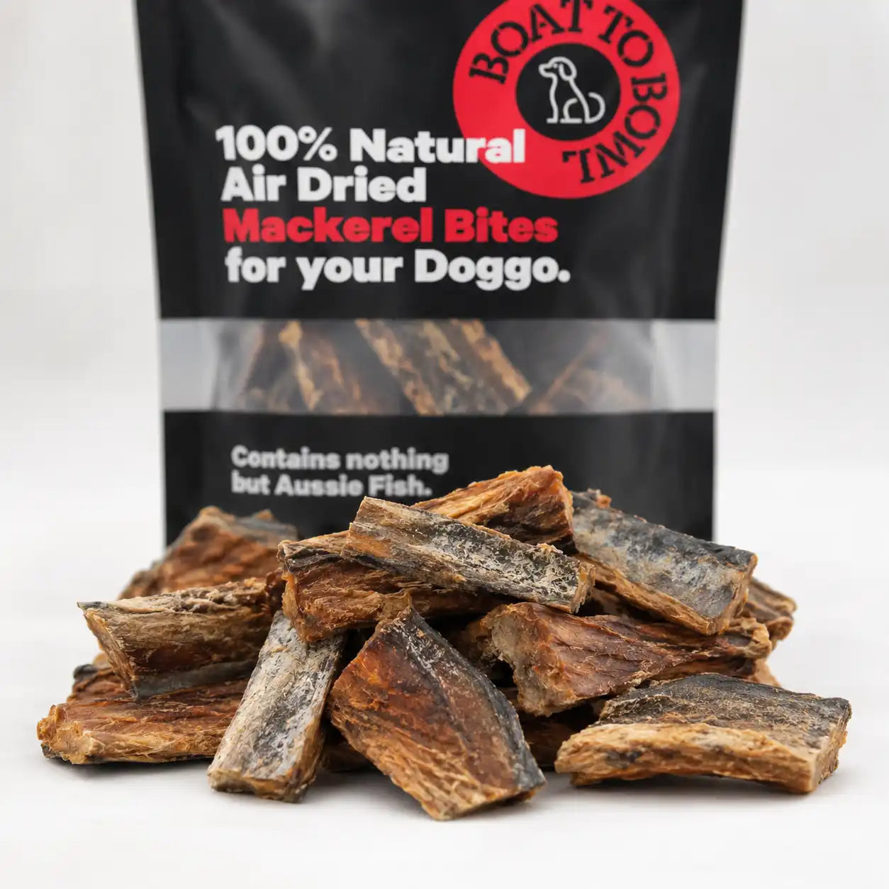Close-up of air-dried mackerel bites for dogs with the mackerel treat bag in the background.