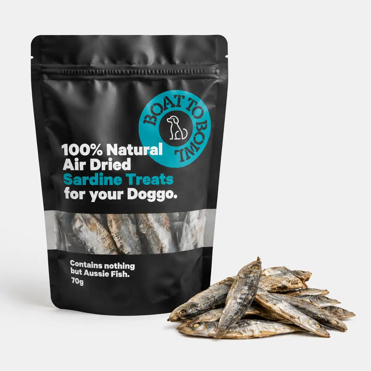Air-dried sardine dog treats in a 70g black pouch with dried sardines beside the bag.