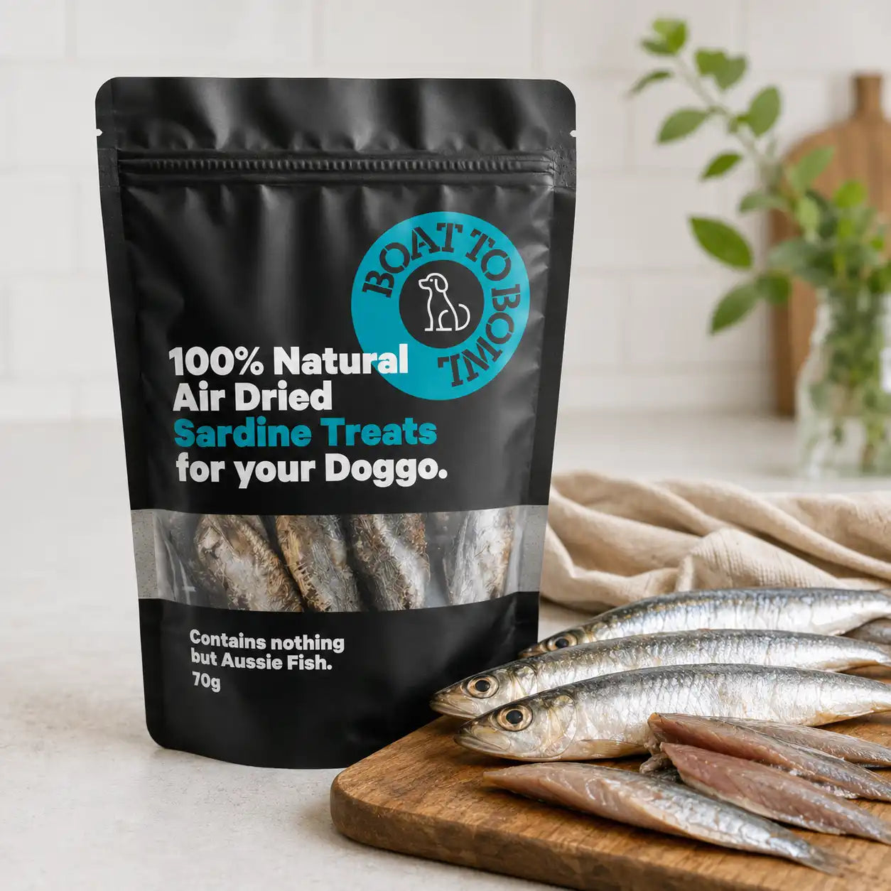 Sardine dog treats displayed with fresh sardines to show the Aussie fish ingredient source.