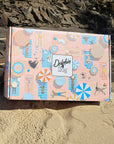 Beautifully designed gift box filled with unique dog gifts, ideal for dog lovers. Perfect for special occasions like birthdays and Christmas, offering personalised options for pets.