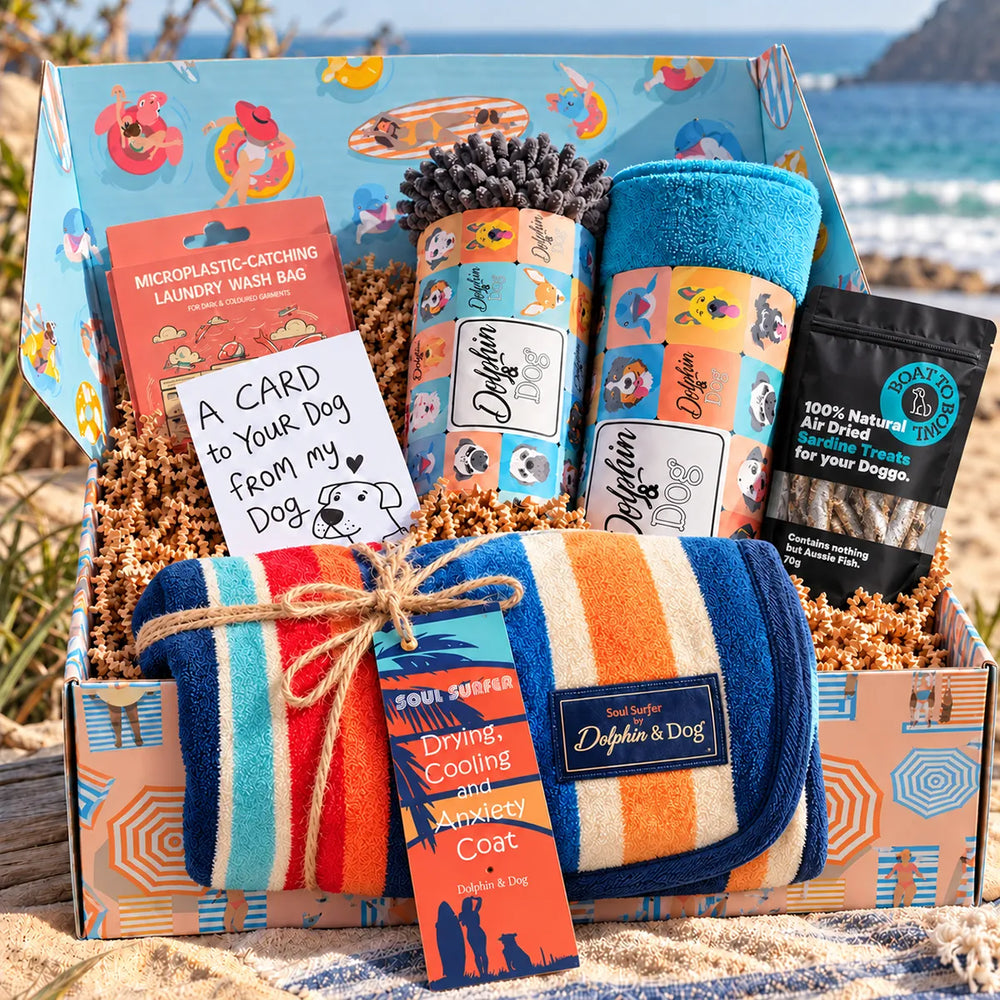 Dolphin & Dog gift box filled with dog gifts and a greeting card