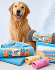 Wet golden retriever sitting behind a blue Dolphin & Dog dog towel, chamois towels and absorbent dog drying towels.