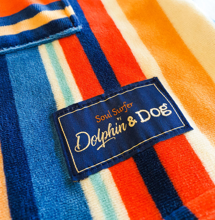 Soft, absorbent kids hooded towel perfect as a surf poncho or beach robe to keep little ones warm and dry after swimming and beach fun.